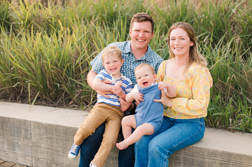 A family of four is pictured seated at one of a local photographer's favorite places to take photos in Houston